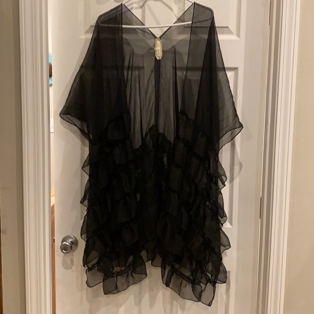Like new. Never worn. Smoke free home.